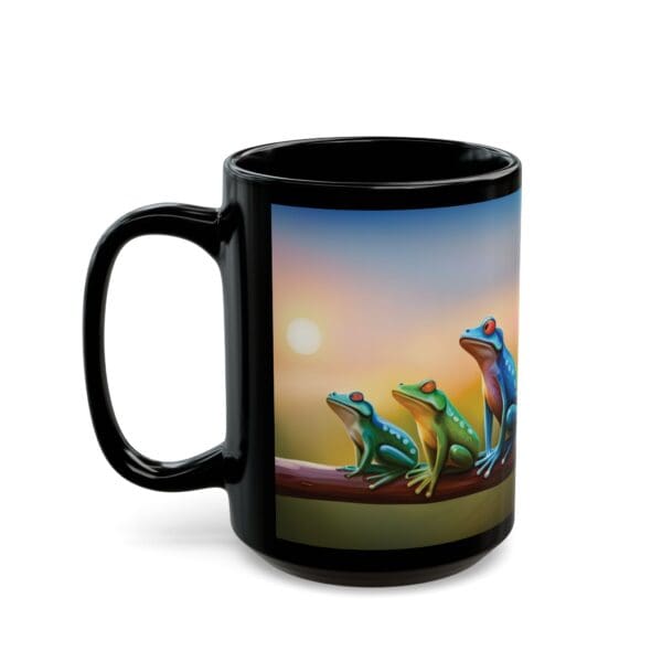 The Colorful Frogs Coffee Mug (available in 11oz and 15oz) features an image of three vibrant frogs perched on a branch against a stunning sunset background.