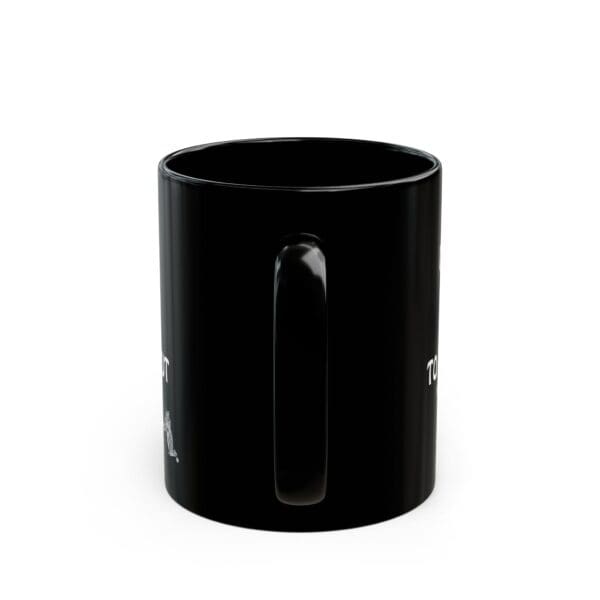 A Zero Dollars Coffee Mug, featuring a black ceramic finish and a handle, positioned against a white background.