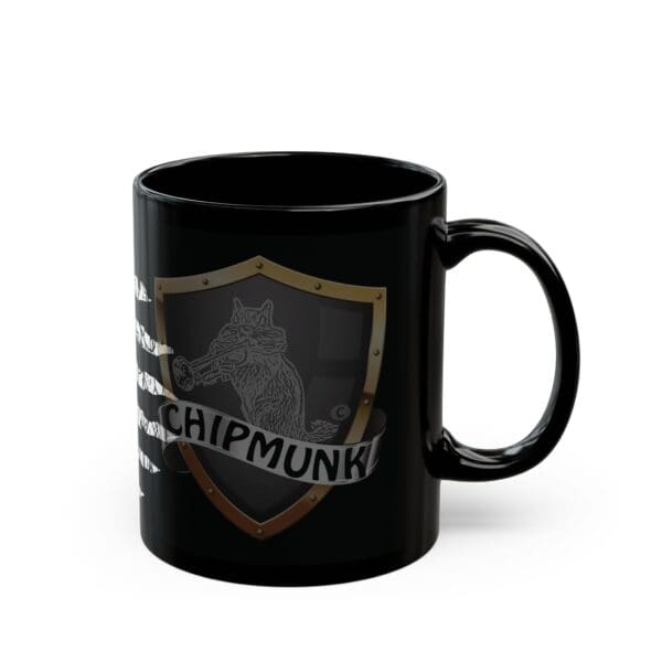 Introducing the American Pride Coffee Mug: a black ceramic mug with a glossy finish, showcasing a chipmunk illustration within a shield emblem and the word "CHIPMUNK!" on a banner beneath it.