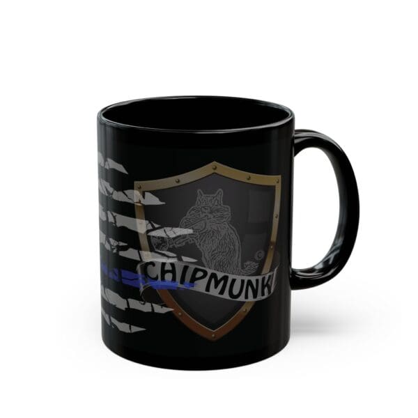 The Police Support Coffee Mug is a black ceramic mug featuring a drawing of a chipmunk holding a shotgun, placed on a shield with the text "Chipmunk" below.