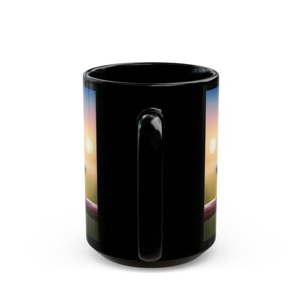 A black ceramic coffee mug with a handle, available in 11oz and 15oz sizes, featuring an image of colorful frogs on its side.