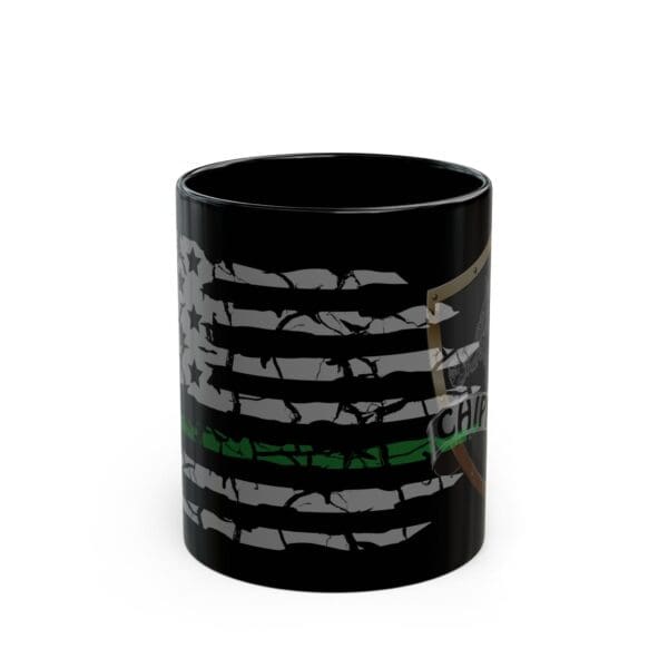 A Military Support Coffee Mug featuring an American flag design with a green stripe and a partially visible badge with "CHIP" on it.