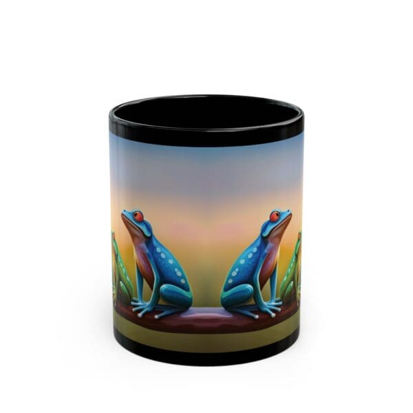 The Colorful Frogs Coffee Mug, available in both 11oz and 15oz sizes, showcases a black ceramic design featuring two vibrant frogs facing outward while perched on a branch against a gradient sunset-hued background.