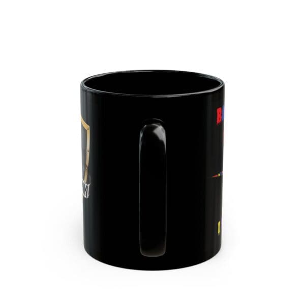 A black ceramic mug with a handle, featuring partially visible logos and text that read "Unicorn Coffee Mug - Back the F*** Up, Sparkle Tits!" on its surface.