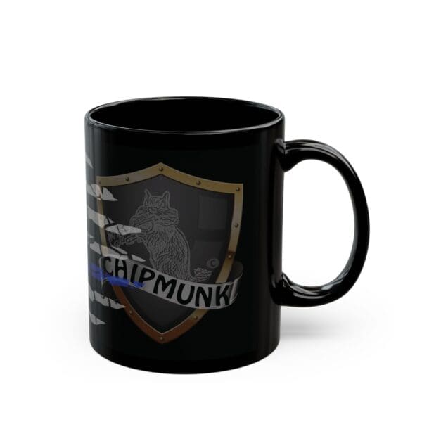 The Police Support Coffee Mug is a black coffee mug showcasing an illustration of a chipmunk holding an envelope within a shield emblem, with the text "CHIPMUNK" below.