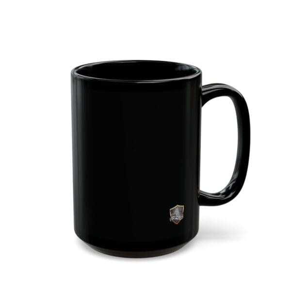 An Angry Cat Coffee Mug (available in 11oz and 15oz sizes) featuring a plain black ceramic design with a small, subtle crest logo near the base, placed on a white background.