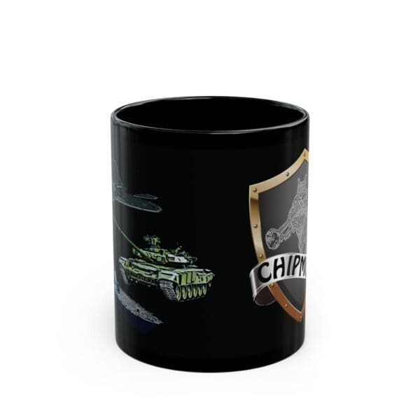 A black Land, Sea, and Air Coffee Mug adorned with military-themed graphics, featuring a tank, an aircraft, and a shield emblem labeled "CHIPMUNK".