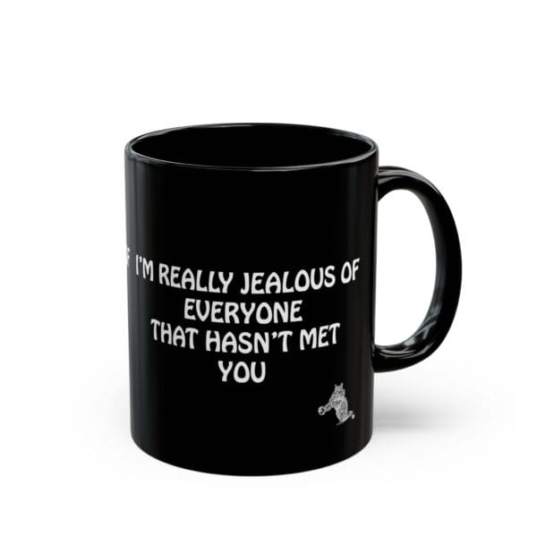 Product Name: Jealous Coffee Mug

Description: A black coffee mug adorned with white text that says, "I'm really jealous of everyone that hasn't met you," paired with a charming small cat illustration.