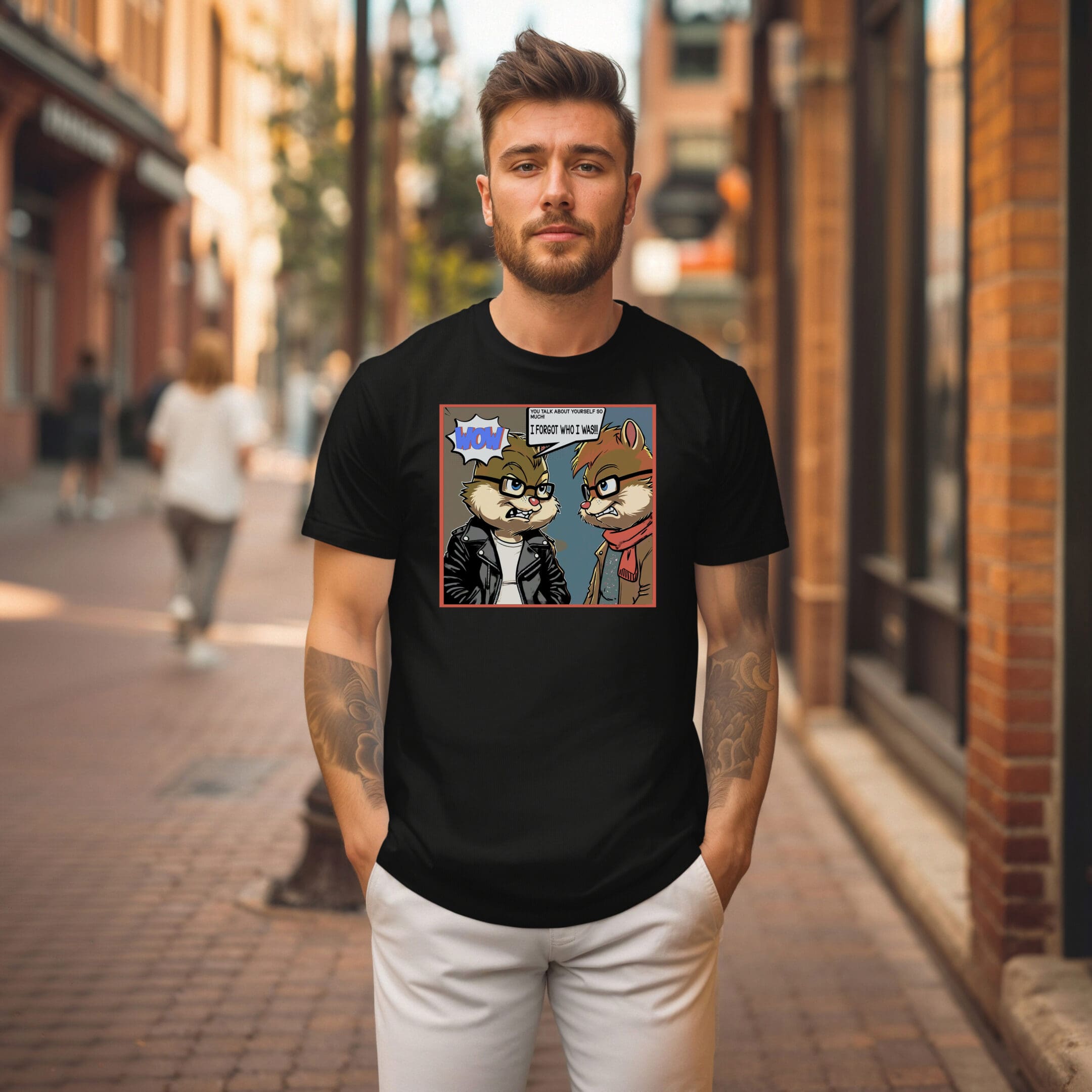 A man stands on a city street wearing the Overt Narcissism - Forgetting Myself Graphic Tee, featuring a cartoon graphic of two animals having a conversation.