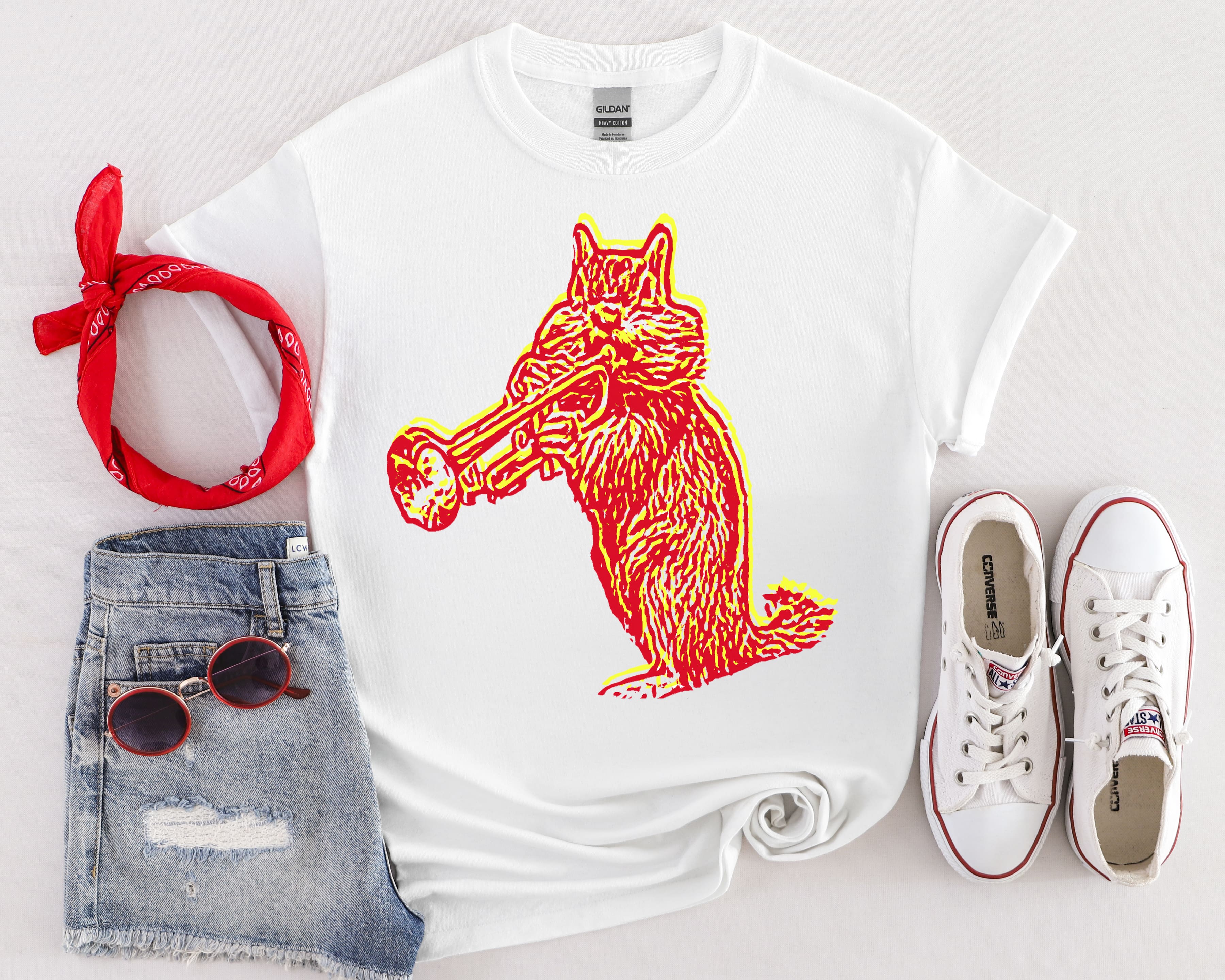 Chipmunk T-Shirt featuring a red and yellow graphic of a wolf with a trumpet, paired with denim shorts, a red bandana, sunglasses, and white sneakers on a white background.