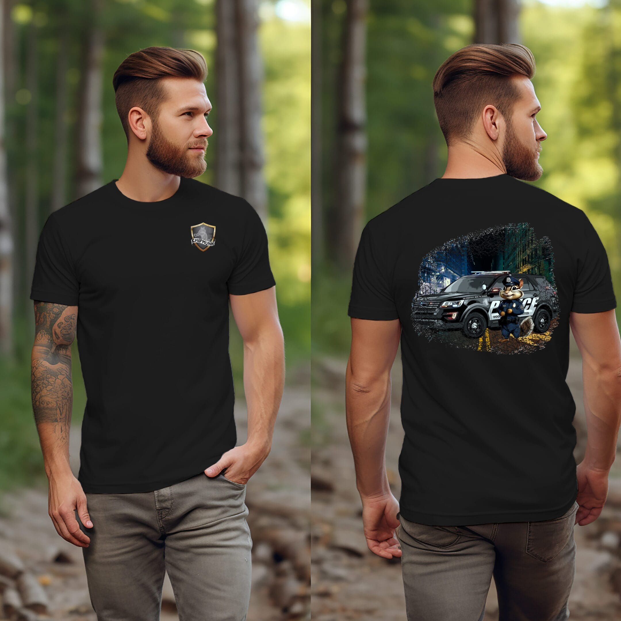 A man wearing a Police Car T-Shirt, featuring a small emblem on the front and a large graphic of an off-road vehicle on the back, stands on a forest pathway.