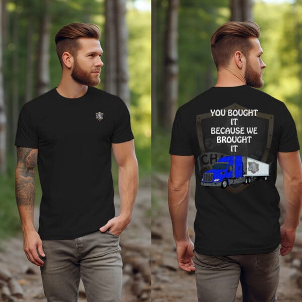 A man stands in a wooded area, wearing the "You Bought It Because We Brought It" T-Shirt. The front view displays a small emblem, while the back features a blue truck graphic accompanied by the text, "You bought it because we brought it.