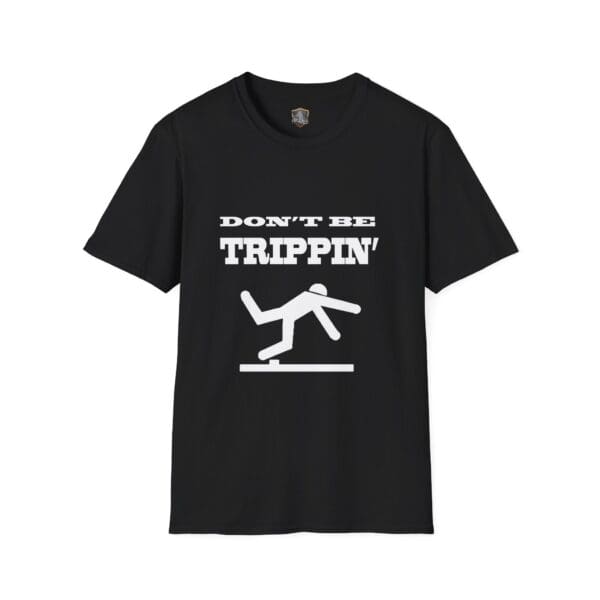 Don't Be Trippin'" T-Shirt featuring a black design with an illustration of a person tripping over a line and the slogan in white text.