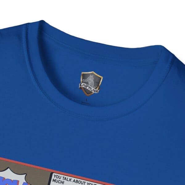 Close-up of the "Overt Narcissism - Forgetting Myself Graphic Tee," featuring a blue comic strip design and a "Chipmunk" logo on the tag near the collar.