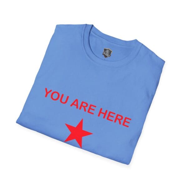 Guiding Star Tee Shirt in blue, featuring red "YOU ARE HERE" text and a red star beneath it, folded neatly.