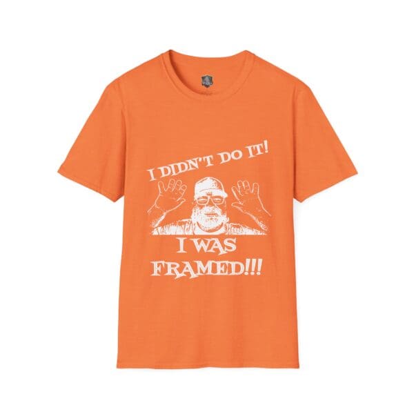 George the Roadie's Iconic Icebreaker T-Shirt features a design of a person raising their hands and the phrase "I DIDN'T DO IT! I WAS FRAMED!!!" in white print.