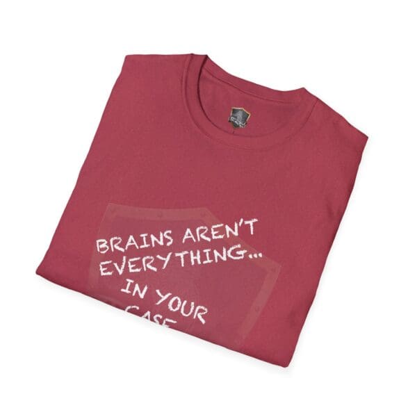 A folded "Nothing T-Shirt" in red, featuring centered white text: "BRAINS AREN'T EVERYTHING... IN YOUR CASE.