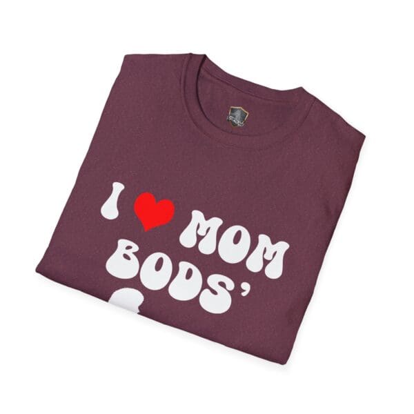 Folded maroon "I ❤️ Mom Bods" t-shirt featuring white and red text on the front.