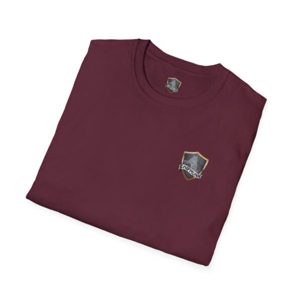 Folded maroon Chipmunk Family T-Shirt showcasing a small shield emblem with text on the front.