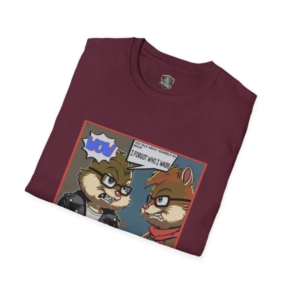 The "Overt Narcissism - Forgetting Myself Graphic Tee" is a maroon t-shirt featuring cartoon chipmunks in glasses and jackets, with one saying, "Wow," and the other responding, "You talk about yourself a lot. I forgot who I was.