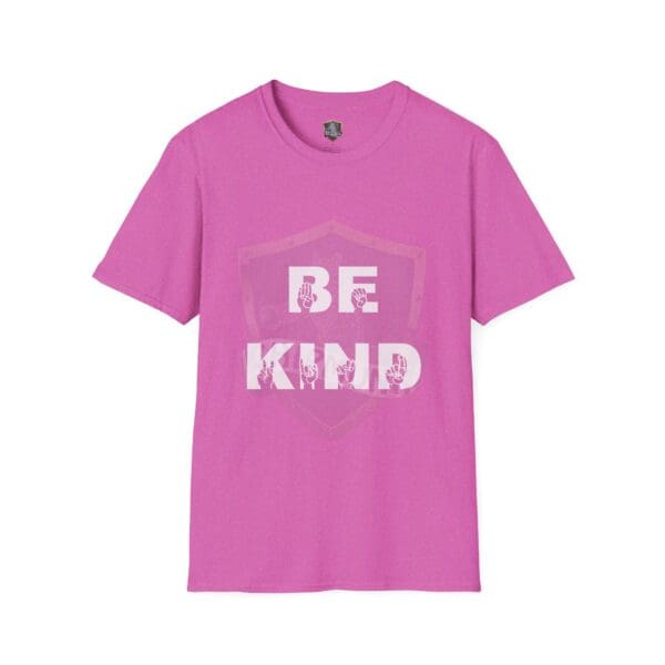 The Be Kind in Sign Language T-Shirt is a pink t-shirt featuring "BE KIND" printed in bold white letters over a subtle shield design.