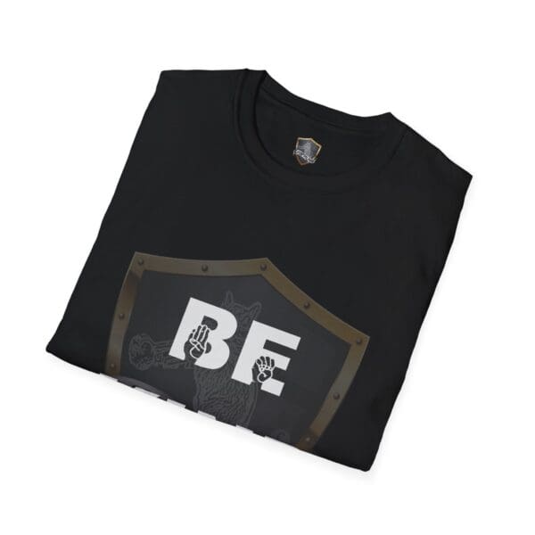 Black T-shirt with a folded design showcasing a shield motif, featuring the letters "BE" and hand gestures in white, called the Be Kind in Sign Language T-Shirt.