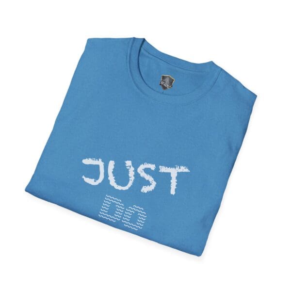 Blue folded t-shirt with the text "Just Do Your Job!" in white.