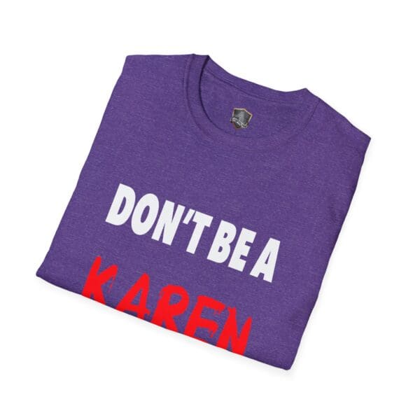 A neatly folded purple "Don't Be a Karen" T-Shirt, featuring the bold text printed in white and red.