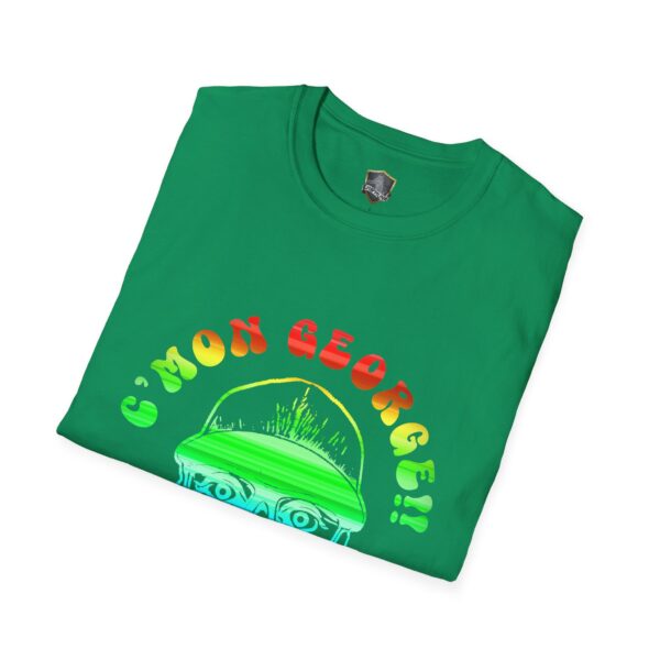 The "C'mon George!! Retro Rainbow Roadie T-Shirt" is a green tee featuring the vibrant text "C'MON GEORGE!!" above an illustrated face donning glasses and a hat.