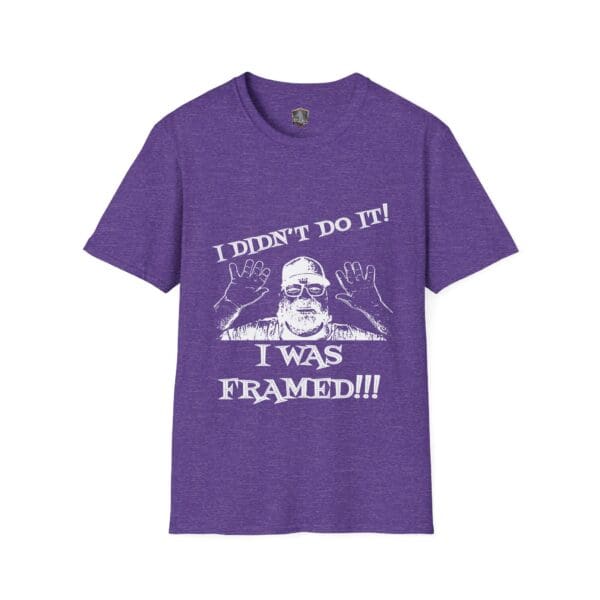 Purple George the Roadie's Iconic Icebreaker T-Shirt featuring white text: "I DIDN'T DO IT! I WAS FRAMED!!!" with an illustration of a person with raised hands.