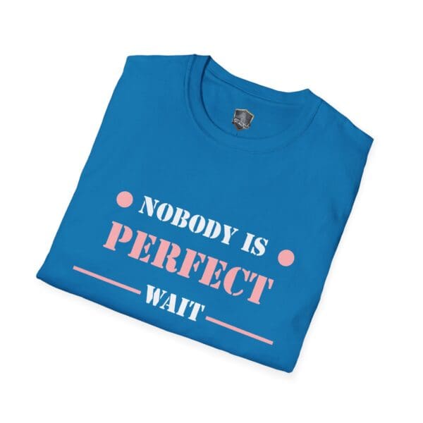 Product: "Nobody Is Perfect" Statement T-Shirt in blue featuring pink and white lettering, neatly folded on a white background.