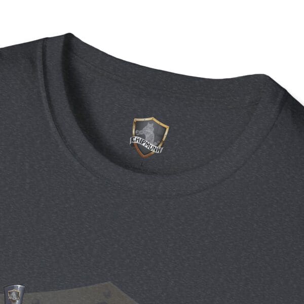 Close-up of the dark gray Admission T-Shirt showcasing a shield logo and "Chipmunk" text on the inside collar.