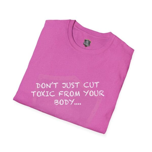 Pink folded t-shirt featuring the text "Don't Just Cut Toxic from Your Body, Cut It from Your Life!" in white.