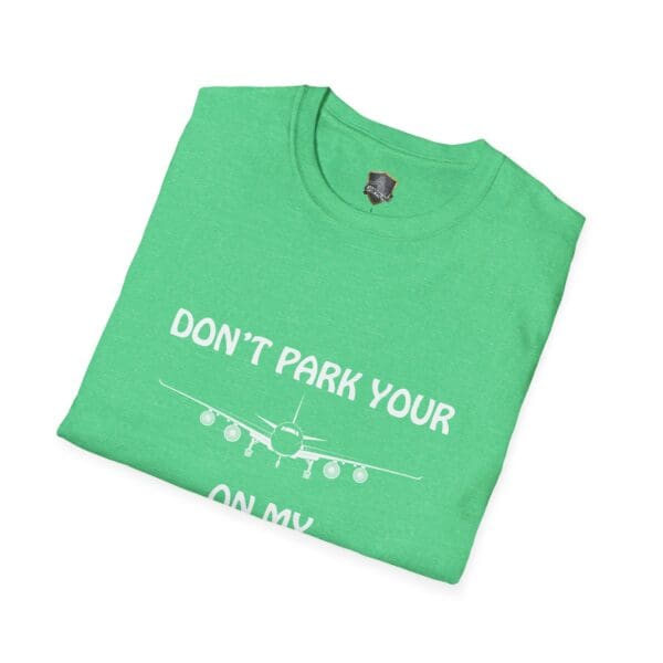 Green T-shirt featuring a white airplane graphic and the text "DON'T PARK YOUR PLANE ON MY" in white, named "Don't Park Your Plane On My Dingy T-Shirt.