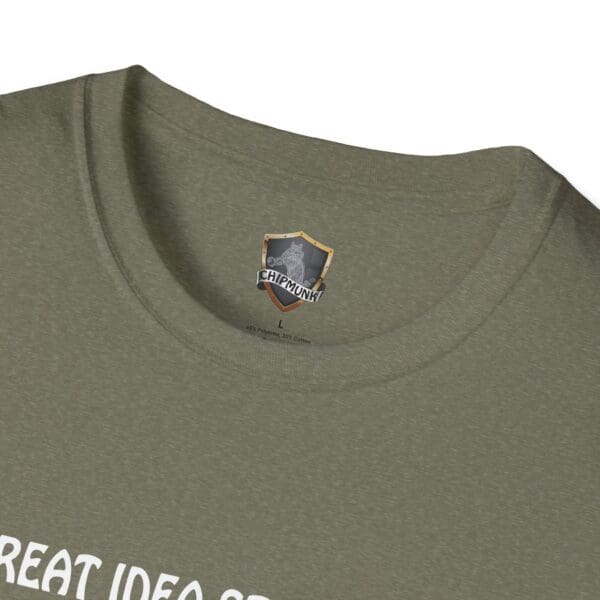 Close-up of a green Great Idea T-Shirt collar featuring a small Chipmunk brand label, with partially visible text on the shirt.