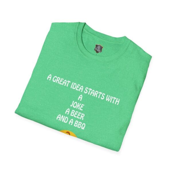 Folded Great Idea T-Shirt in green, featuring the phrase "A great idea starts with a joke, a beer, and a BBQ" in white letters.