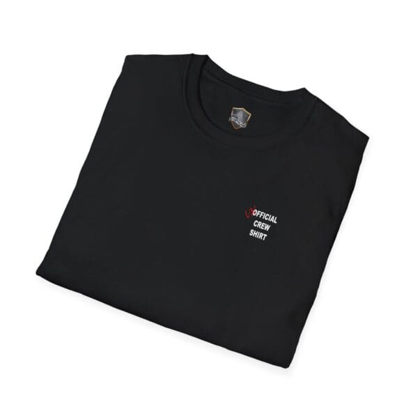 Folded black t-shirt with "Unofficial Crew T-Shirt" printed in white and red on the front.