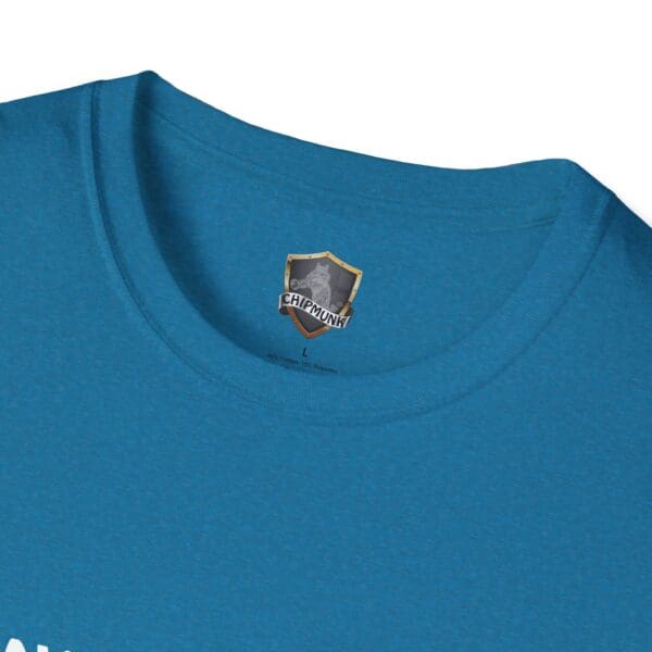 Close-up of a blue crew-neck T-shirt featuring the "Don't Park Your Plane On My Dingy" label on the inside collar.