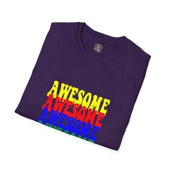 A neatly folded black Awesome Shirt featuring the word "AWESOME" repeated in vibrant yellow, red, blue, and green on the front.