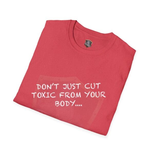 Neatly folded, the red t-shirt features white text that reads, "Don't Just Cut Toxic from Your Body, Cut It from Your Life!