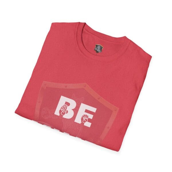 Red Be Kind in Sign Language T-Shirt folded neatly, featuring a design with the text "BE" and a subtle shield graphic.