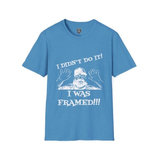 George the Roadie's Iconic Icebreaker T-Shirt in blue, featuring a graphic of a person raising their hands and the white text: "I Didn't Do It! I Was Framed!!!