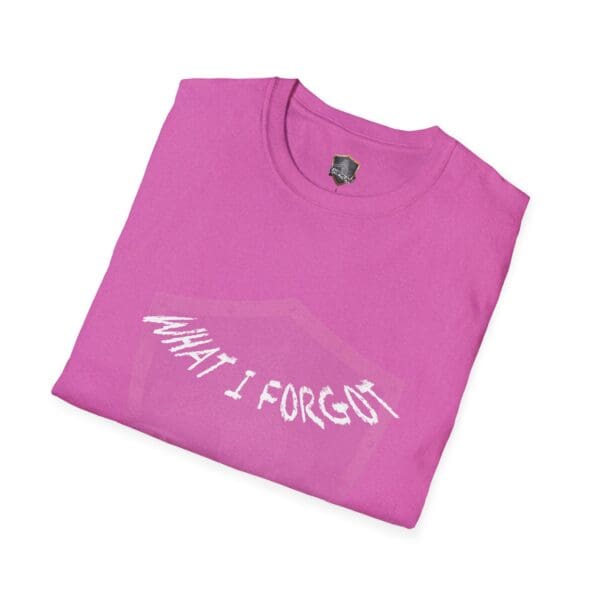 A folded pink t-shirt with a white distorted print of the text from "What I Forgot You Will Never Know T-Shirt.