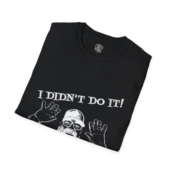 A black T-shirt featuring a graphic of George the Roadie raising their hands, alongside the text "I Didn't Do It! I Was Framed!!!.