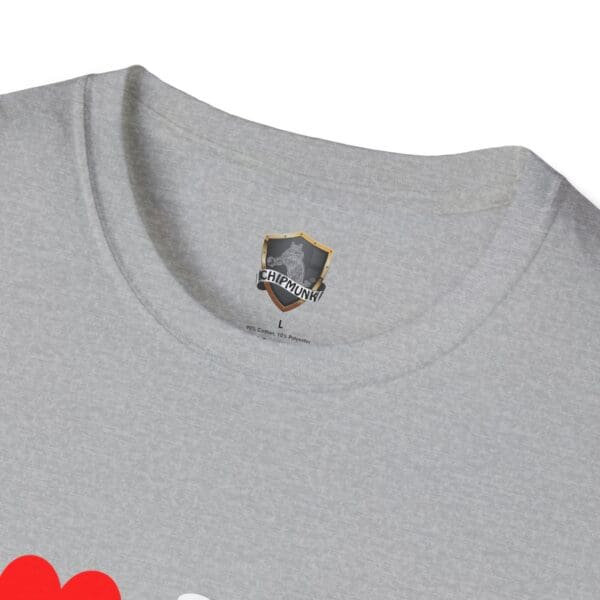 Close-up of a gray "I ❤️ Mom Bods" T-shirt with a "Chipmunk" brand label inside the collar. The fabric appears soft, and part of a red graphic is visible at the bottom.