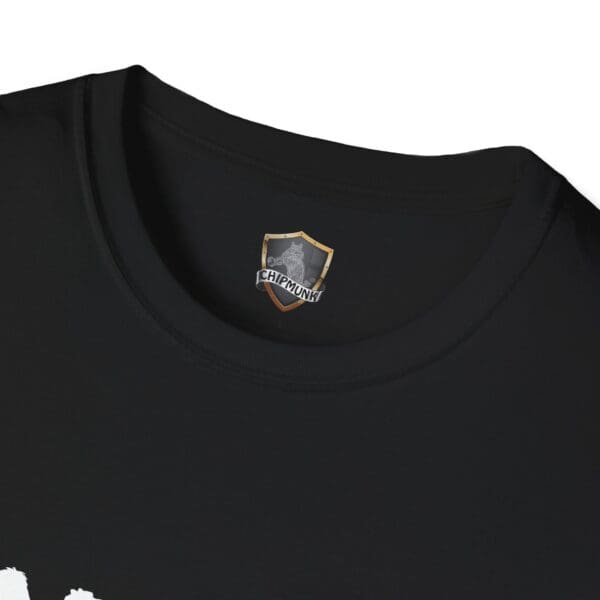 Close-up of a black T-shirt collar featuring a Camel Tow logo and label inside.