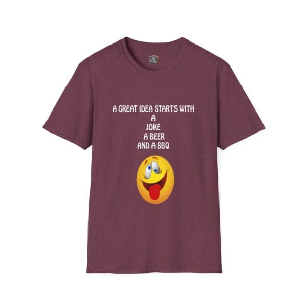 A "Great Idea T-Shirt" in maroon featuring a smiling emoji and white text that reads, "A great idea starts with a joke, a beer, and a BBQ.