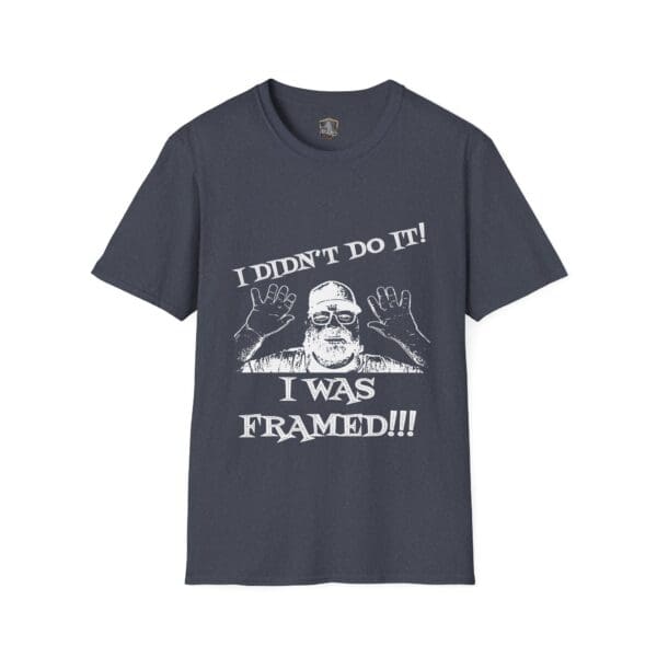 George the Roadie's Iconic Icebreaker T-Shirt in dark gray, featuring a graphic of a person raising hands and the bold text: "I DIDN'T DO IT! I WAS FRAMED!!!".