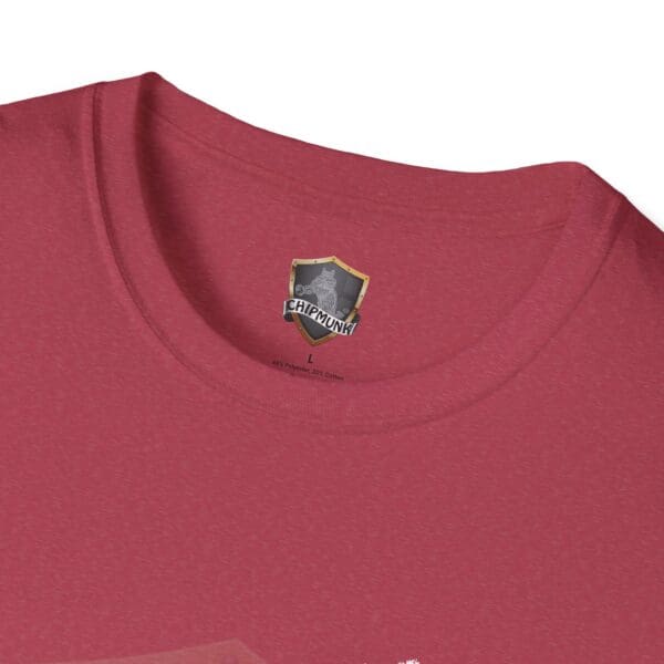 Close-up of a red T-shirt collar with a label featuring a shield and a chipmunk logo, reading "Chipmunk" and size L, made of 65% polyester and 35% cotton, from the Nothing T-Shirt product line.