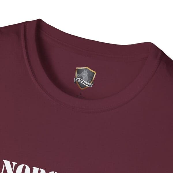 A close-up of a maroon shirt collar with a "Chipmunk" label and part of the printed statement "Nobody Is Perfect".